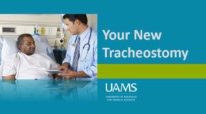 doctor explaining chart to patient with phrase "your new tracheostomy"